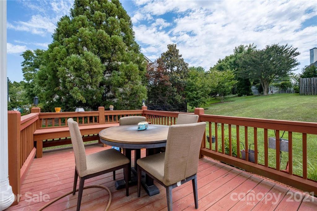 2331 Pimpernel Road Charlotte, NC 28213 - Photo 26 of 30 a balcony with wooden floor and fence
