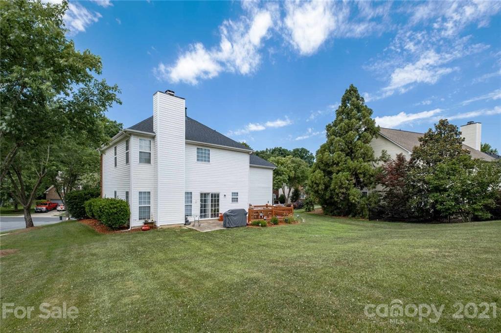 2331 Pimpernel Road Charlotte, NC 28213 - Photo 29 of 30 a view of a house with backyard and trees