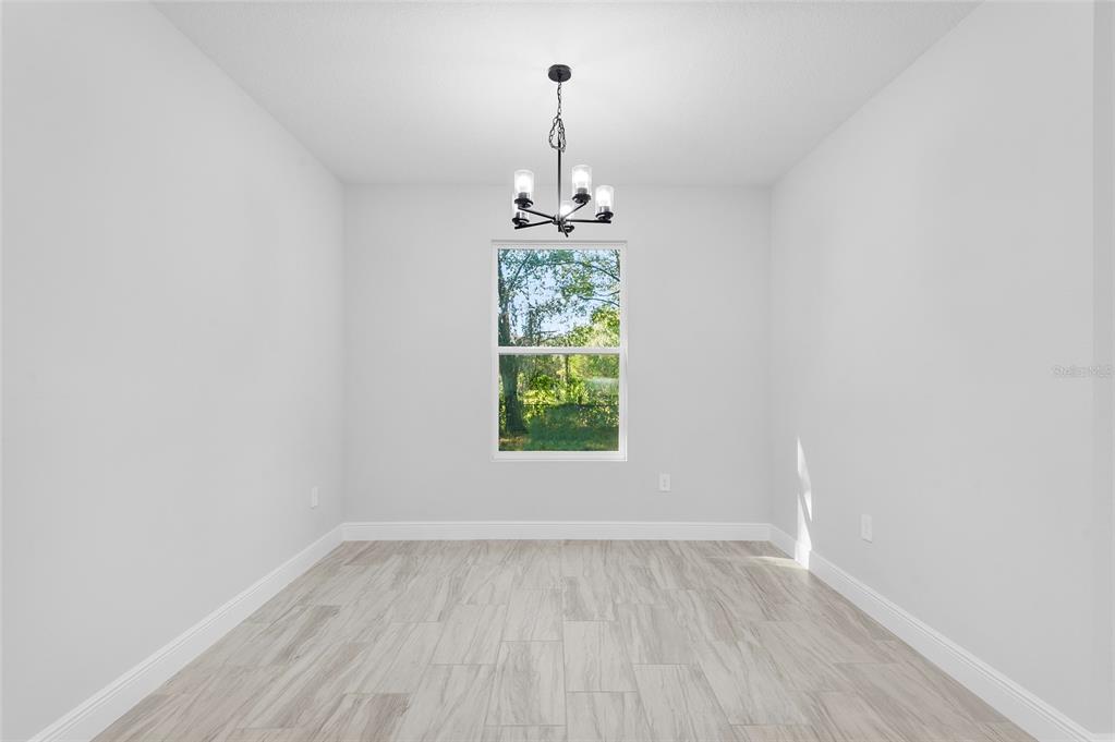 371 Miller Road Sanford, FL 32773 - Photo 13 of 50 a room that has a window in it