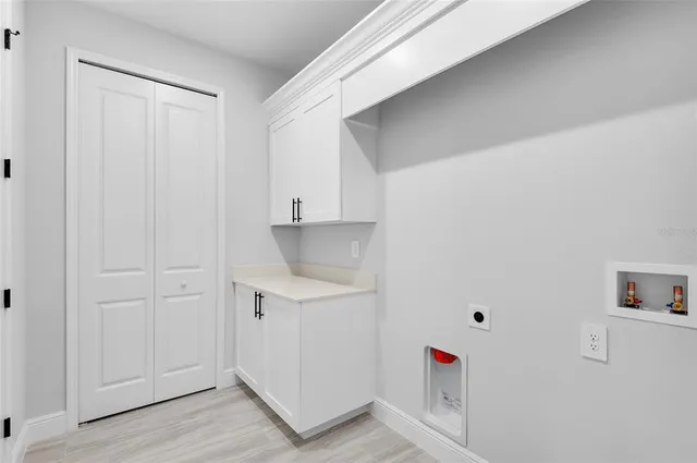 a hallway with cabinets