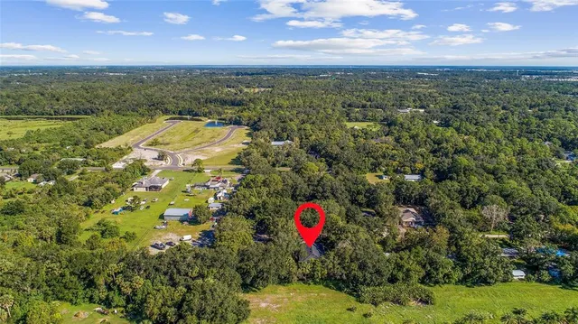 a view of a houses with a yard