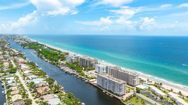 a view of a city with an ocean view