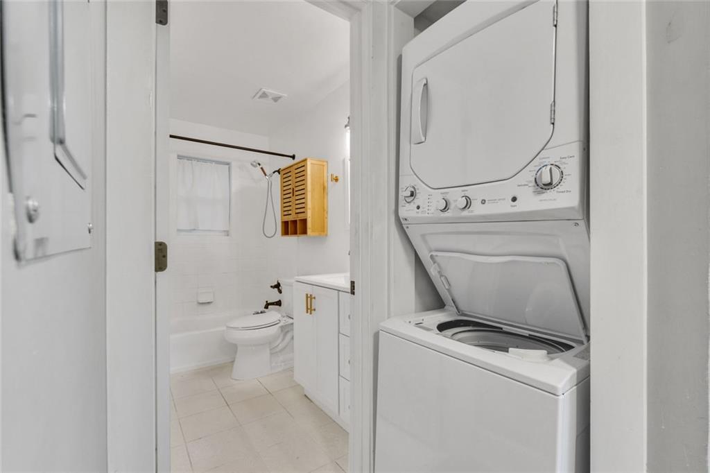 351 Cherokee Avenue Southeast, Unit 6 Atlanta, GA 30312 - Photo 6 of 11 a bathroom with a toilet and a mirror