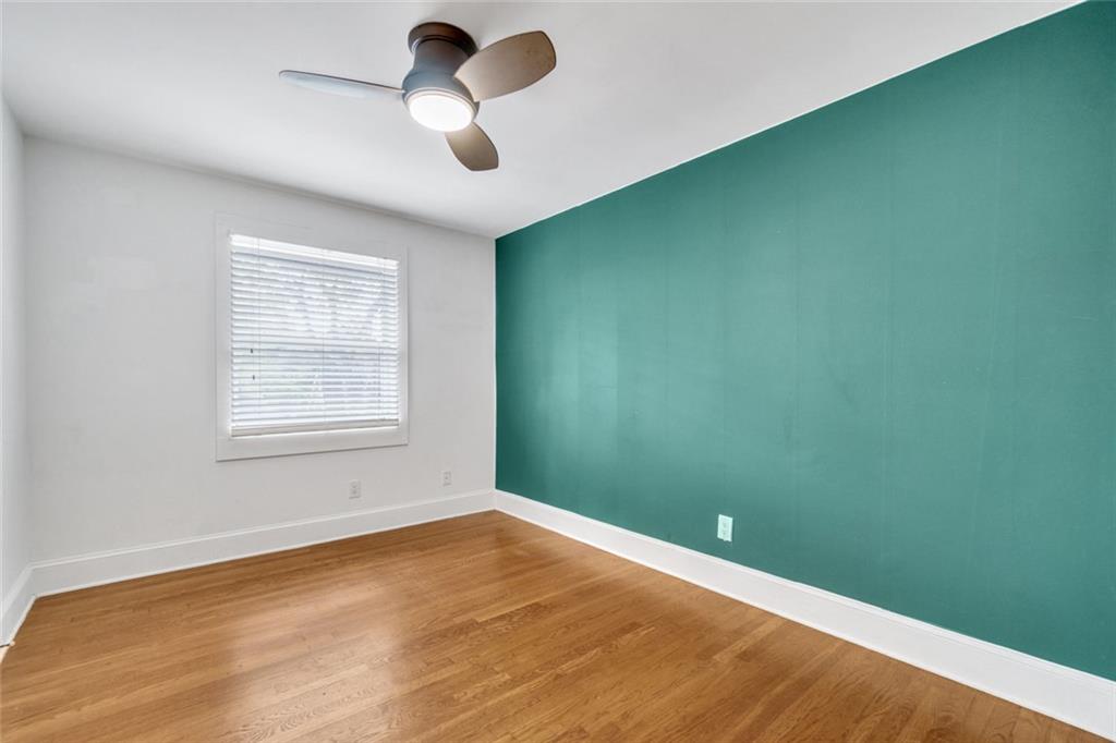 351 Cherokee Avenue Southeast, Unit 6 Atlanta, GA 30312 - Photo 8 of 11 an empty room with a empty space and windows