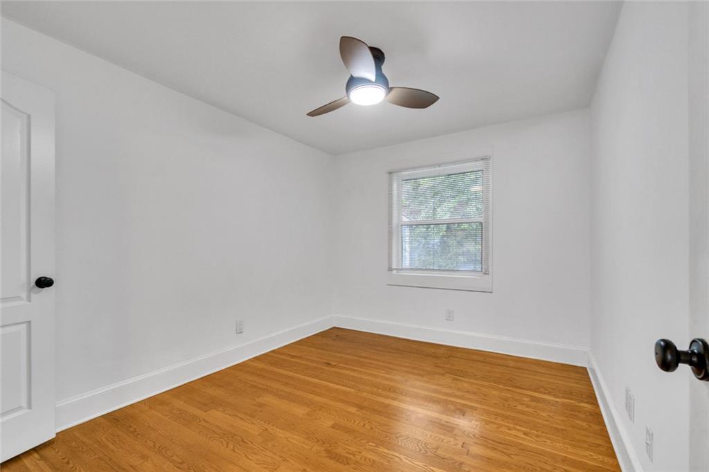 351 Cherokee Avenue Southeast, Unit 6 Atlanta, GA 30312 - Photo 9 of 11 a view of an empty room with a window