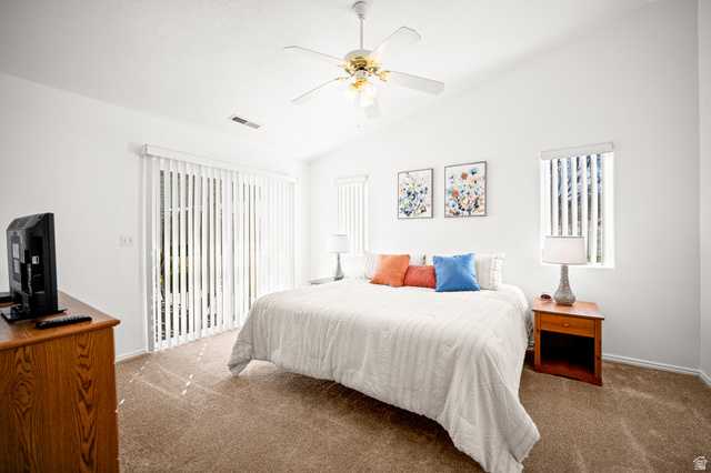 1825 West Mathis Park Place, Unit 46 St. George, UT 84770 - Photo 22 of 45 Bedroom with access to exterior, carpet flooring, lofted ceiling, and a ceiling fan