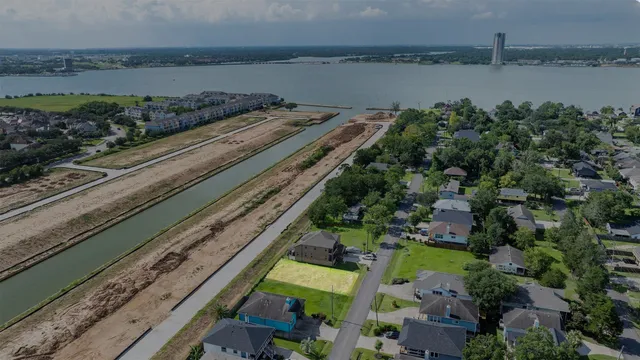 a view of a lake with a city