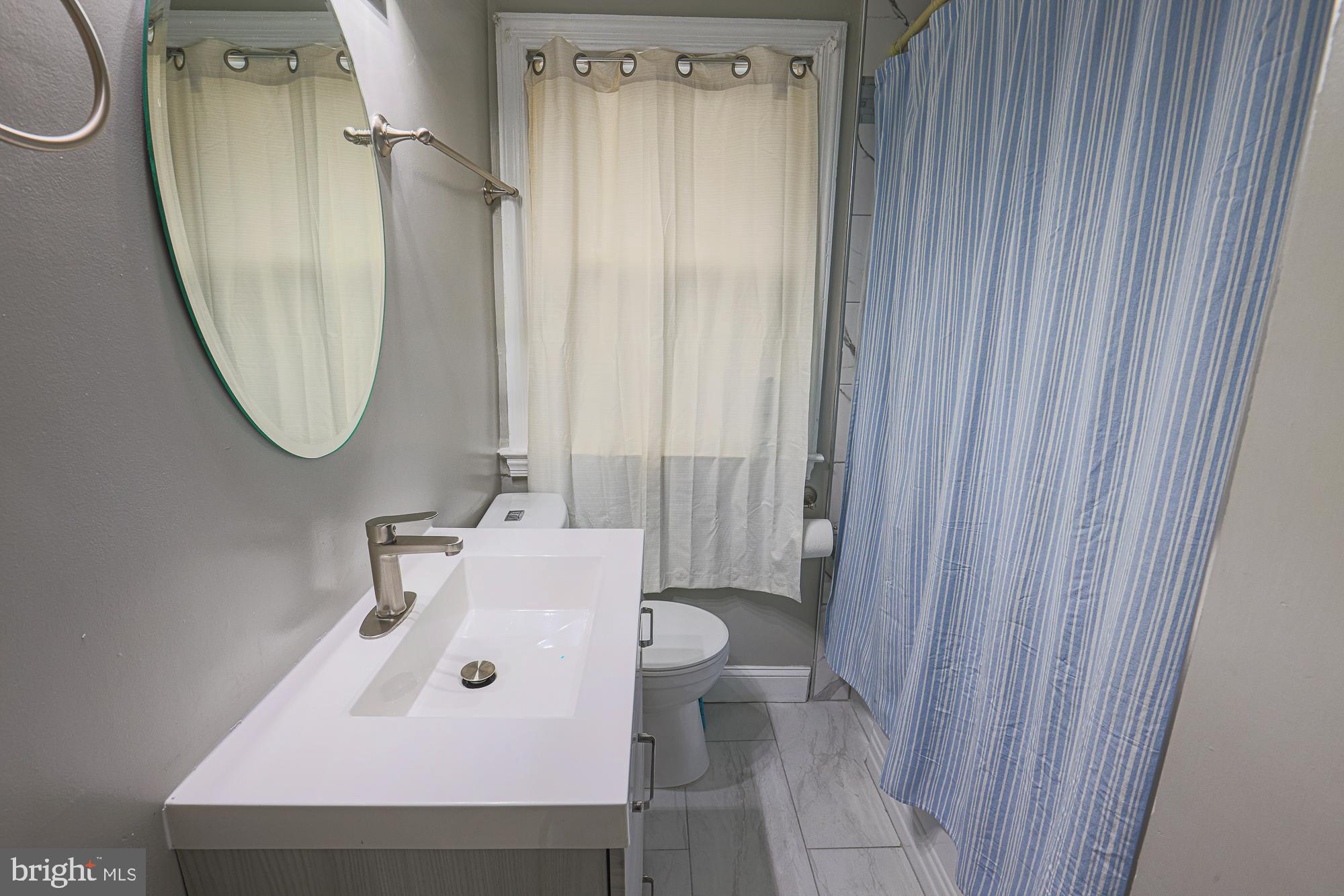 1629 Walterswood Road Baltimore, MD 21239 - Photo 35 of 54 Full Bath on 1st floor