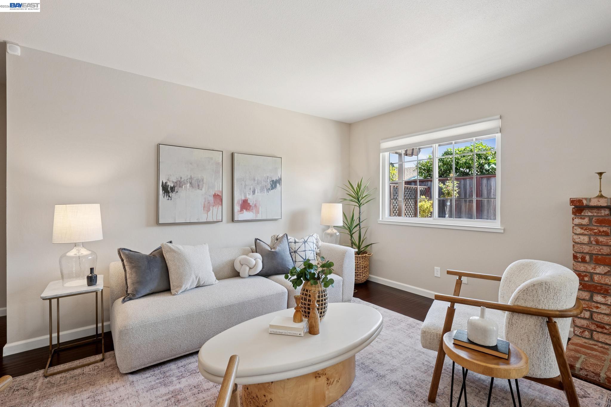 328 Sand Beach Road Alameda, CA 94501 - Photo 11 of 48 a living room with furniture and a potted plant