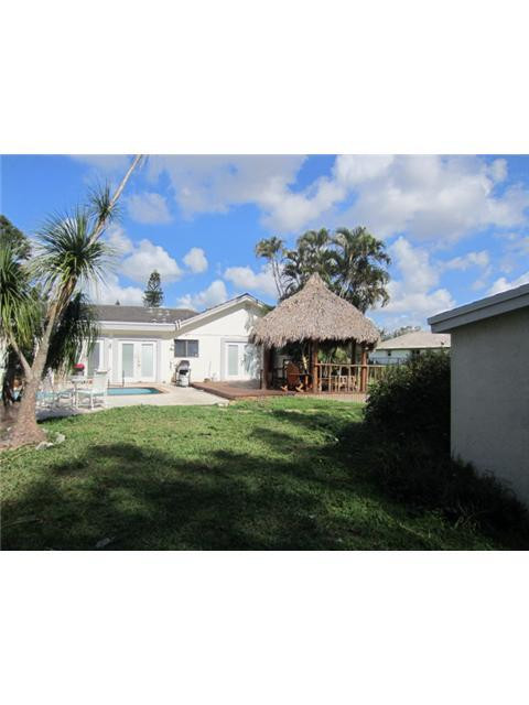 5675 Southwest 111th Terrace Davie, FL 33328 - Photo 10 of 16 a view of a house with a yard