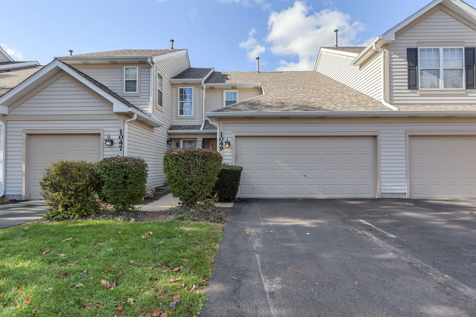 1049 Horizon Ridge Lake In The Hills, IL 60156 - Photo 1 of 5 a front view of a house with a yard and garage