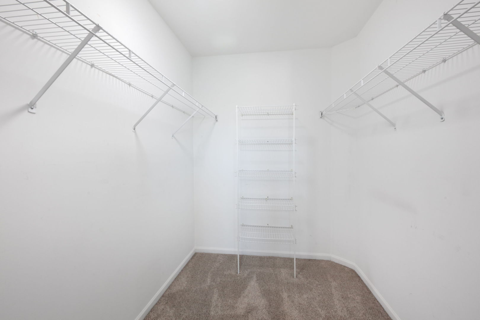 1049 Horizon Ridge Lake In The Hills, IL 60156 - Photo 12 of 25 a view of a room with racks on the wall