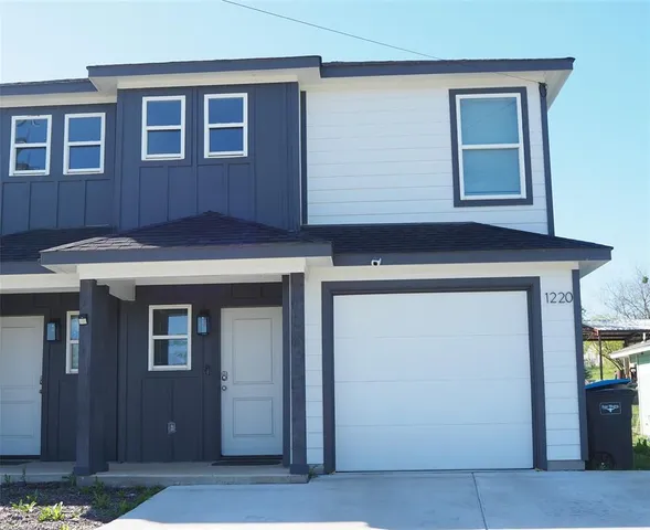 a house view with a outdoor space