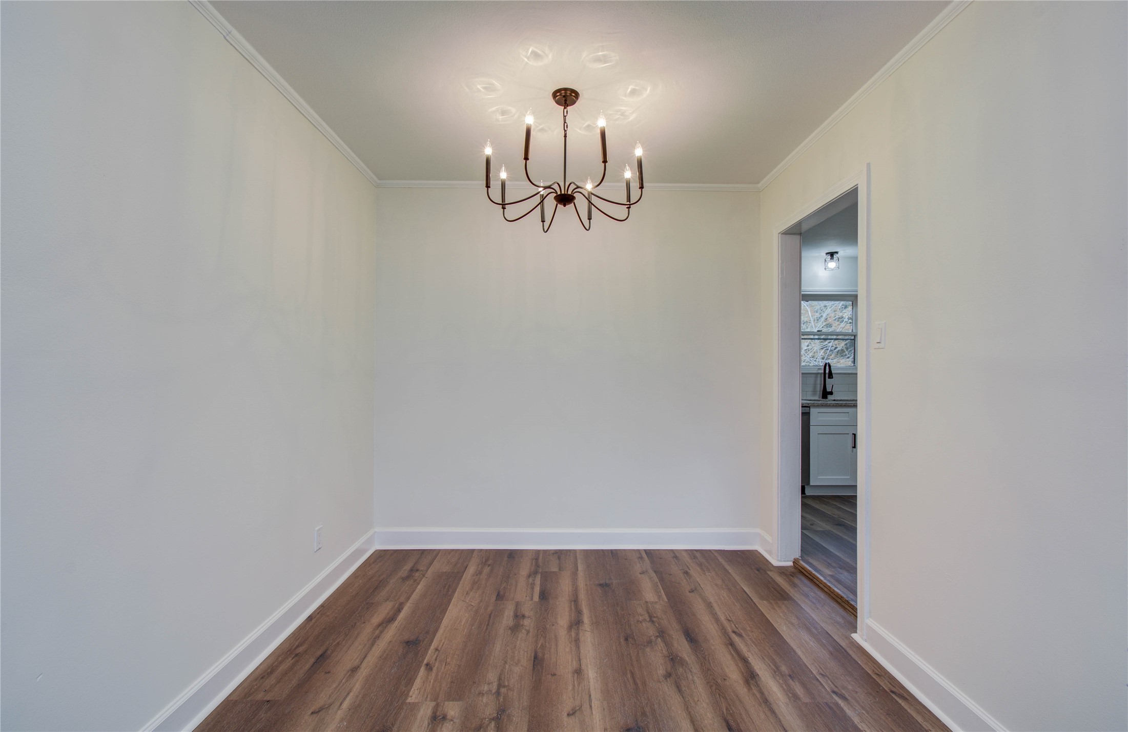 2417 Pecan Street Dickinson, TX 77539 - Photo 25 of 43 a view of empty room with wooden floor