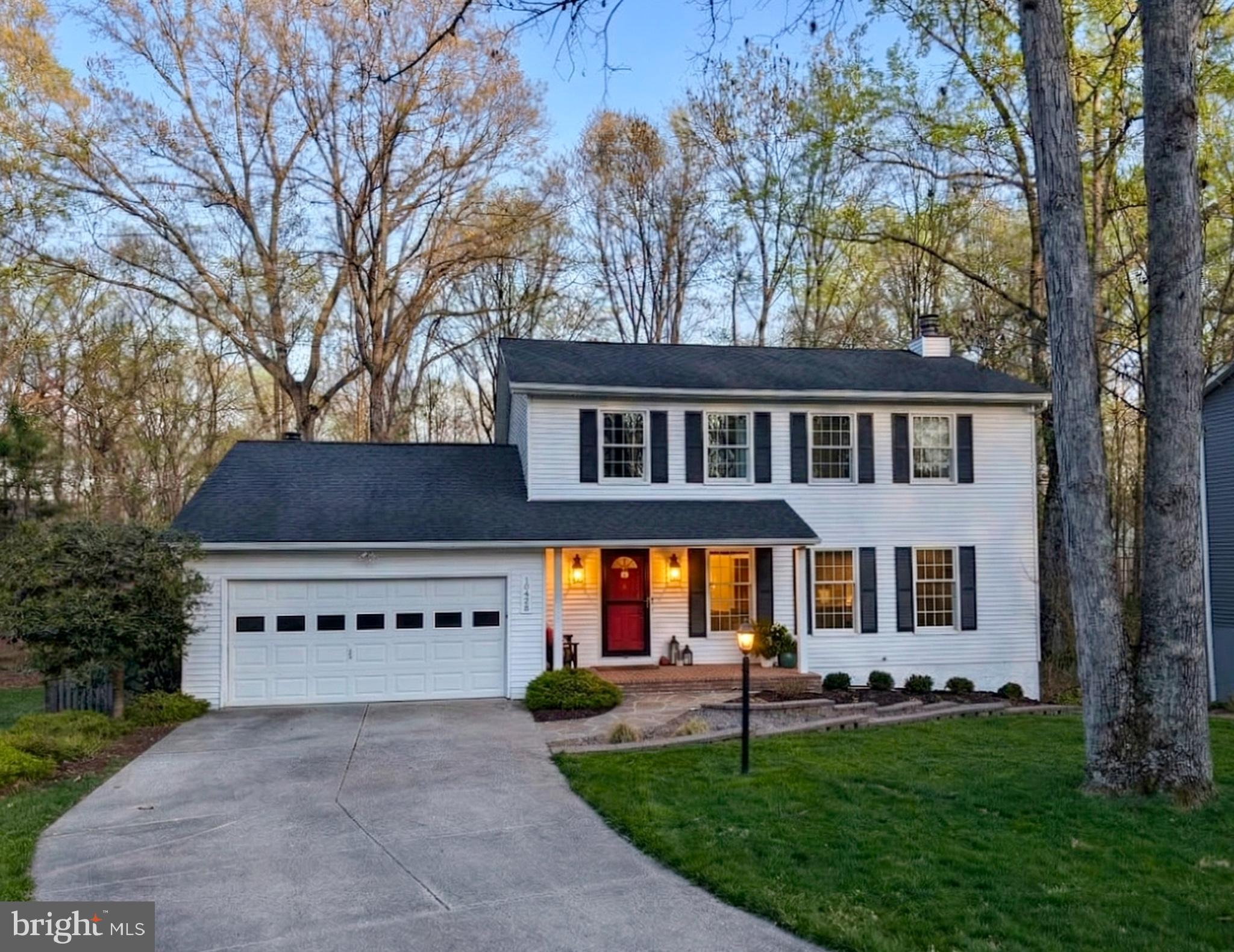 10428 Schoolmaster Place Columbia, MD 21044 - Photo 1 of 69 a view of house with outdoor space and garden