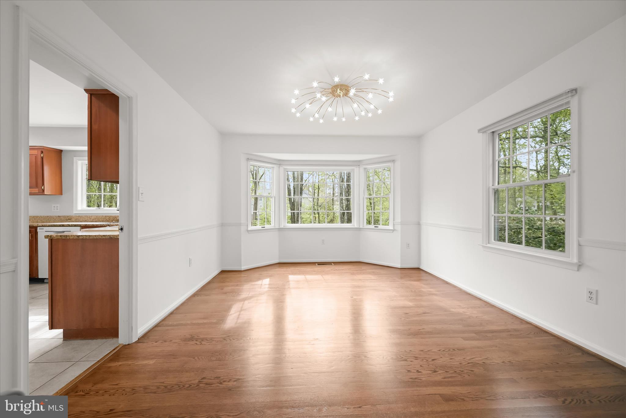 10428 Schoolmaster Place Columbia, MD 21044 - Photo 14 of 69 a view of an empty room with a window