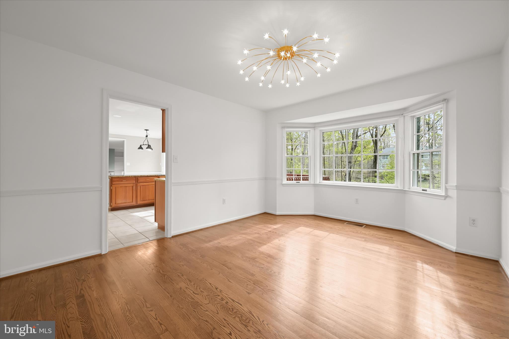 10428 Schoolmaster Place Columbia, MD 21044 - Photo 16 of 69 a view of an empty room with a window