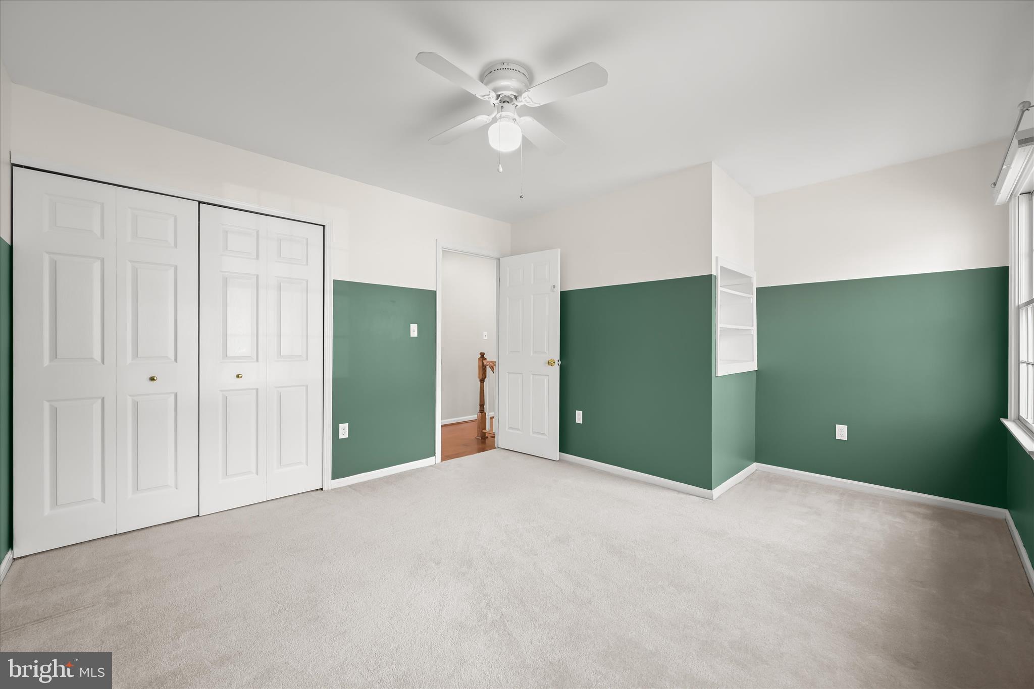 10428 Schoolmaster Place Columbia, MD 21044 - Photo 42 of 69 a big room with closet and a ceiling fan