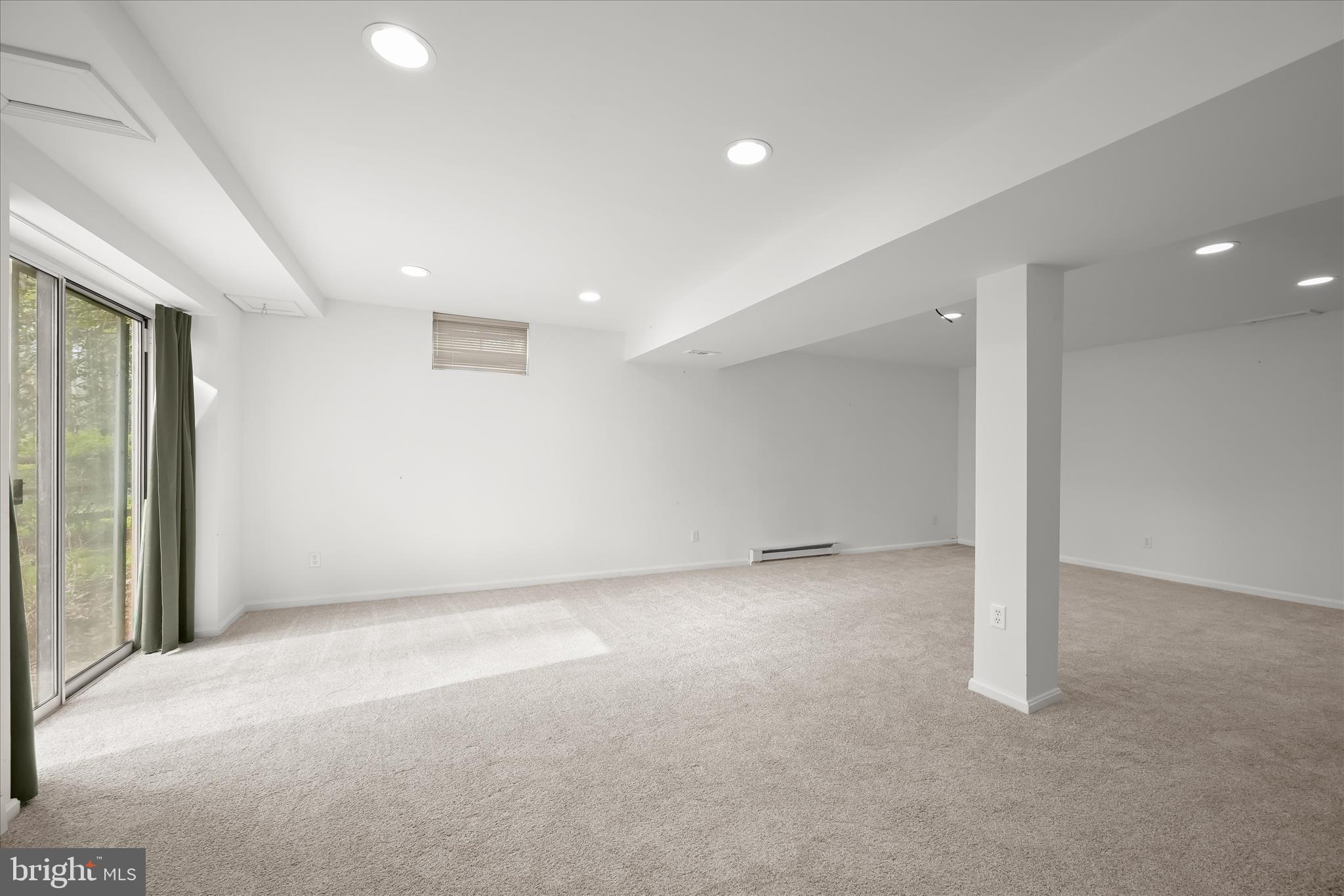 10428 Schoolmaster Place Columbia, MD 21044 - Photo 47 of 69 a view of an empty room with a window