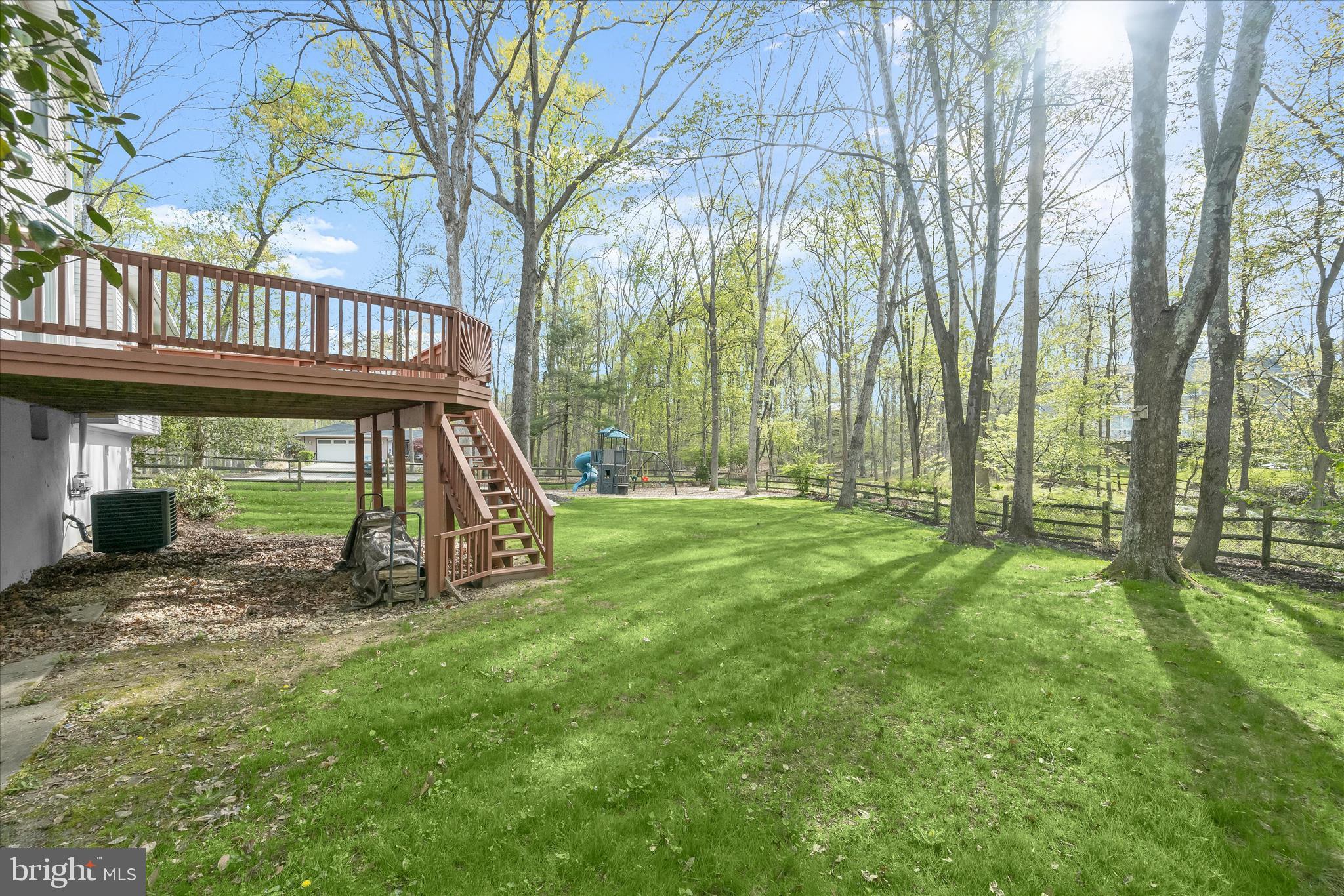 10428 Schoolmaster Place Columbia, MD 21044 - Photo 59 of 69 a view of a house with backyard porch and sitting area