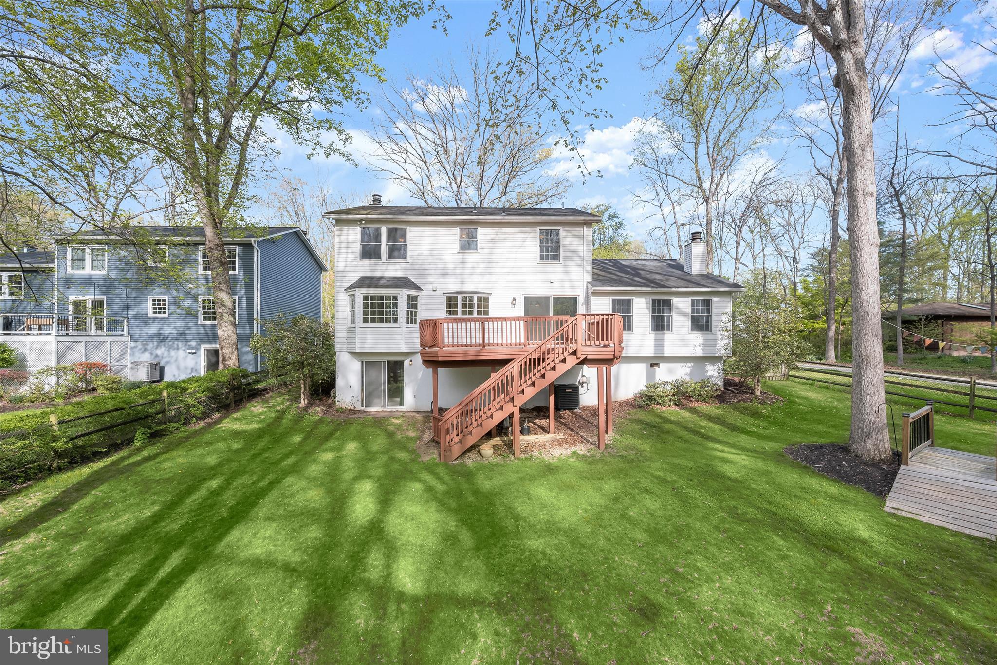 10428 Schoolmaster Place Columbia, MD 21044 - Photo 65 of 69 a view of a house with backyard and a tree