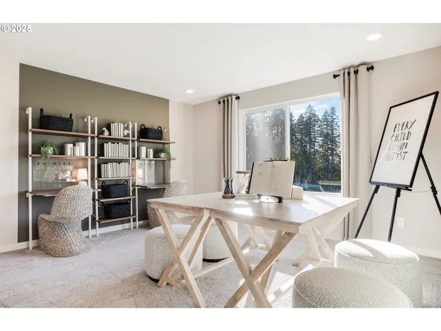 a spacious bedroom with a bed and a large window