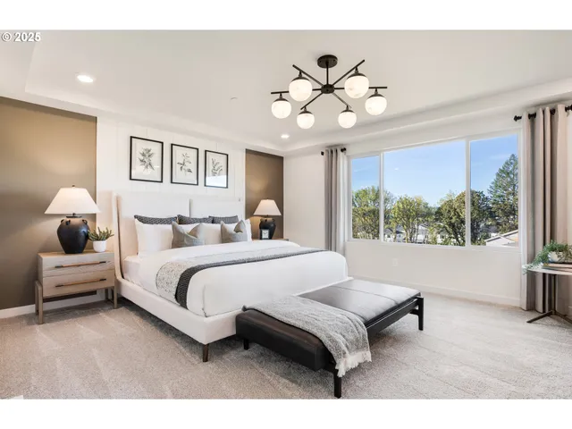 a bathroom with a sink a toilet a mirror and shower