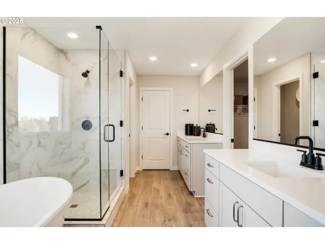 a kitchen with sink and refrigerator