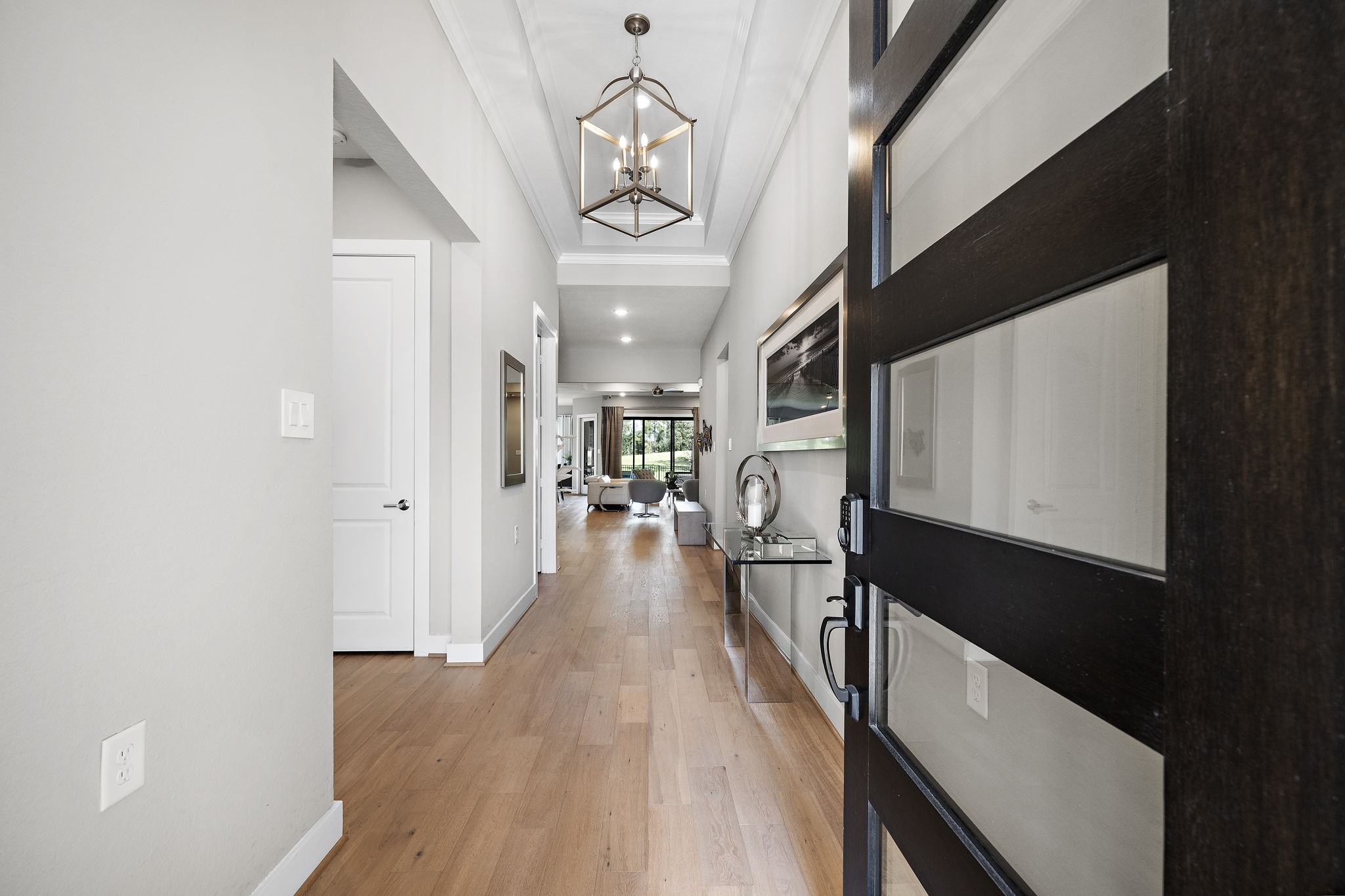 7551 Congress Trl Way Porter, TX 77365 - Photo 4 of 48 a view of a hallway with wooden floor and staircase