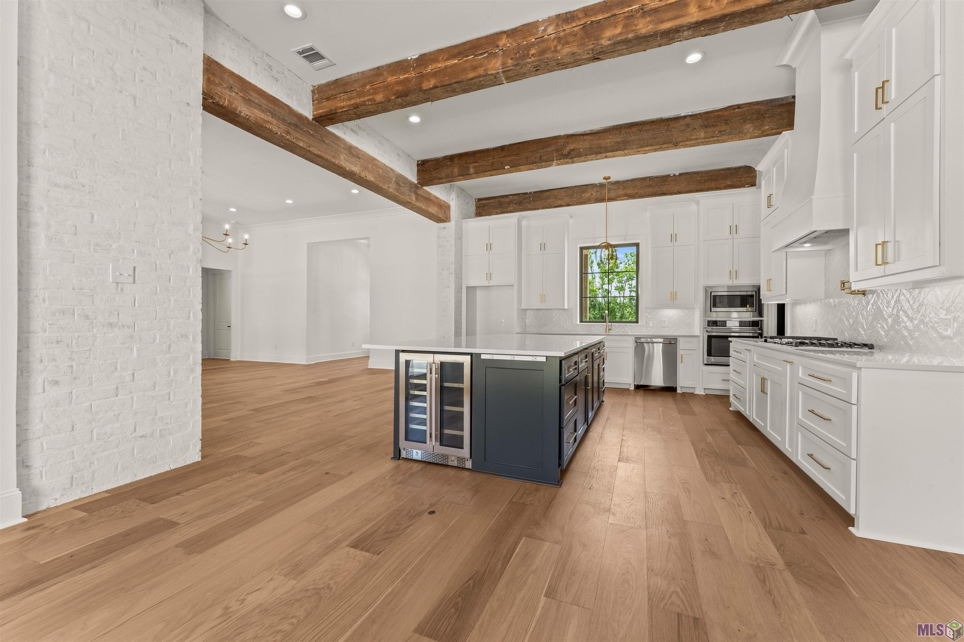 9189 Hillon Hood Road Denham Springs, LA 70726 - Photo 16 of 41 Beverage Center with Upscale Appliance Package !