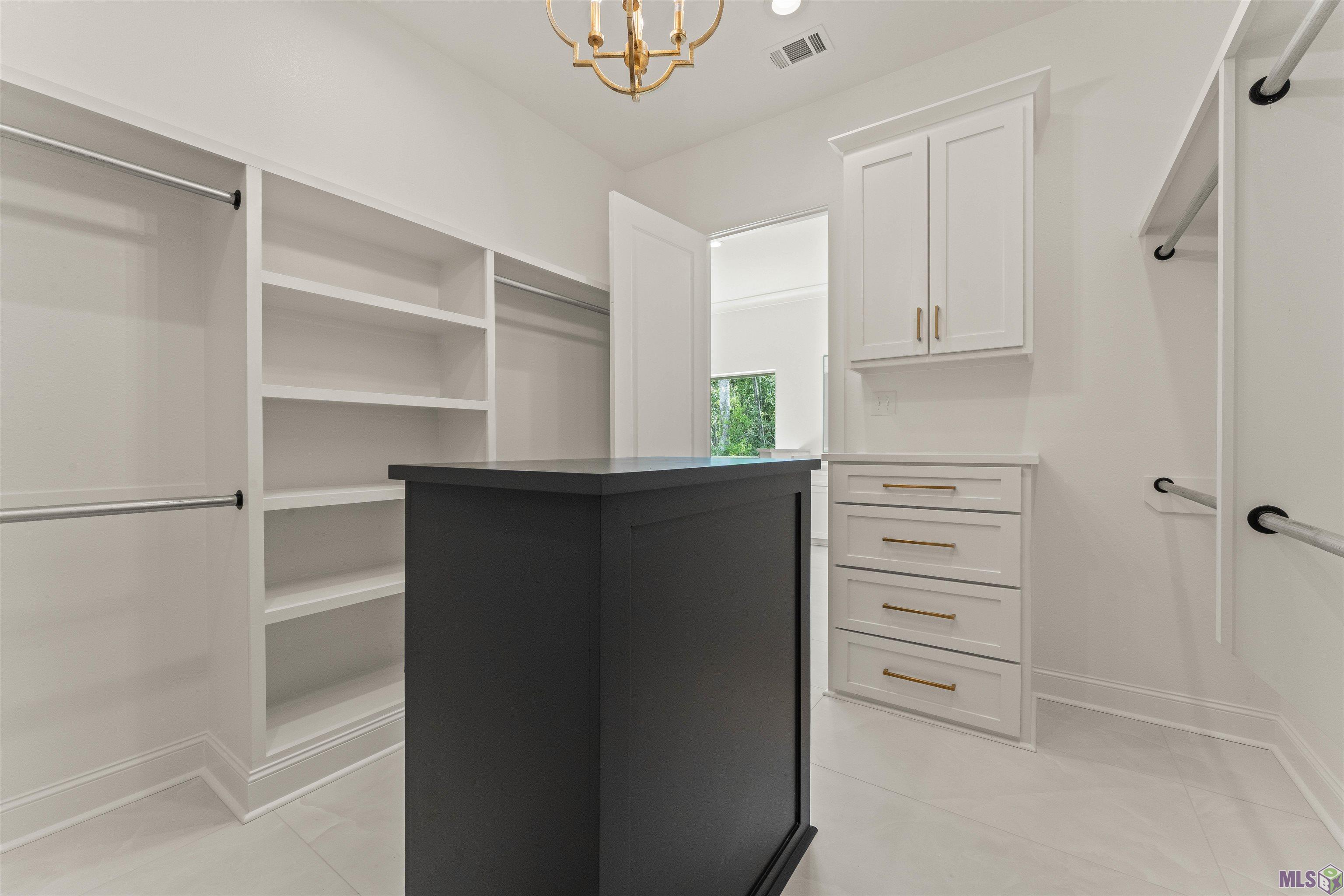 9189 Hillon Hood Road Denham Springs, LA 70726 - Photo 26 of 41 Separate Primary Bath Closet(s)