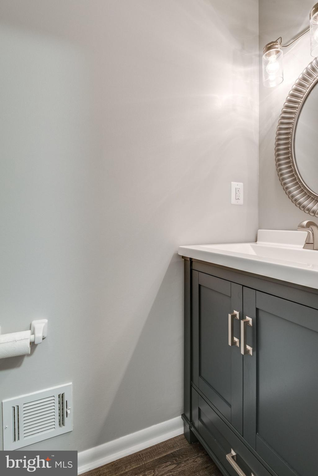 2046 Chadds Ford Drive Reston, VA 20191 - Photo 11 of 52 Remodeled Half Bath on Main Level