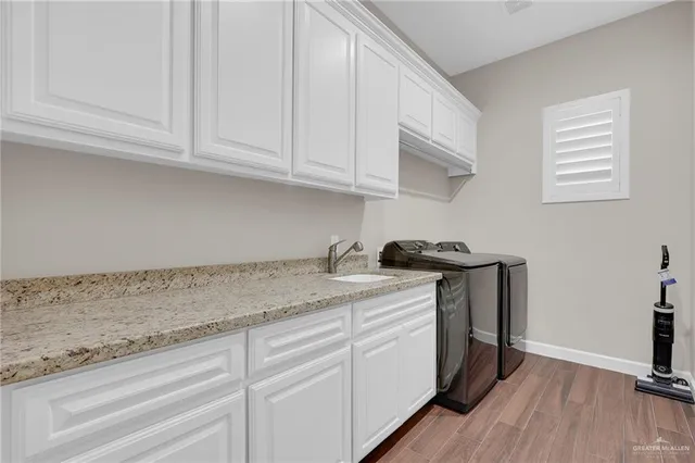 a bedroom with a bed and a ceiling fan