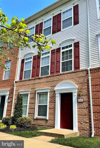a front view of a house with an outdoor space