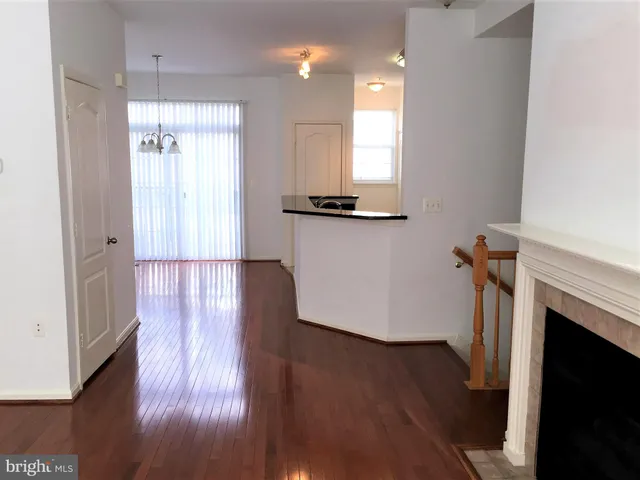 a living room with a fireplace