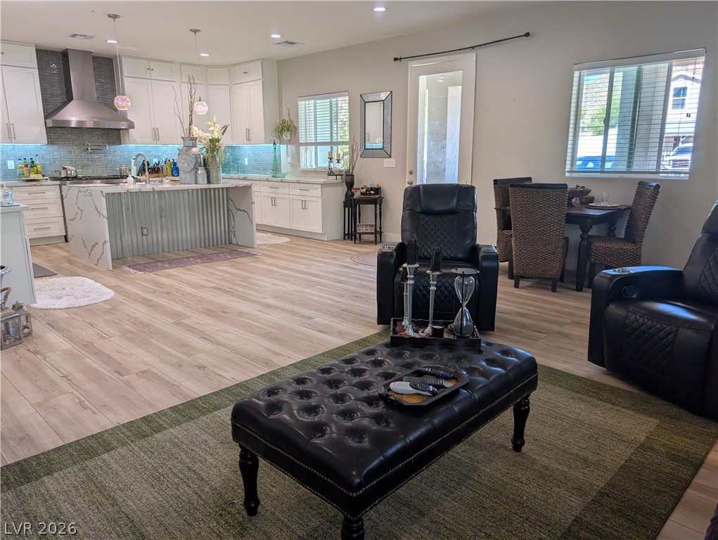 251 Spring Heights Caliente, NV 89008 - Photo 6 of 27 This open concept living space features a modern kitchen and inviting dining area.