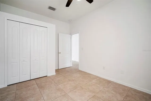 an empty room with a bathroom