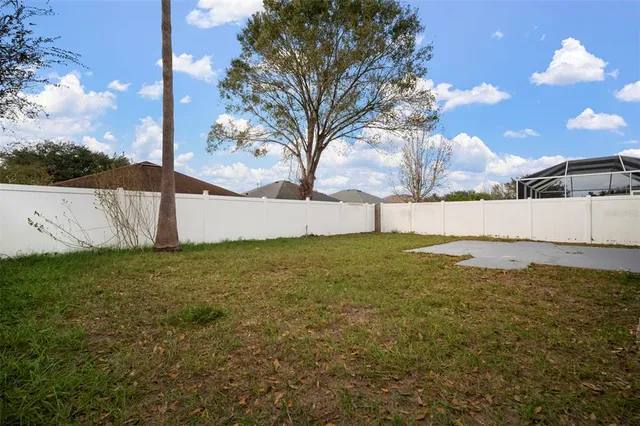 an aerial view of residential building with green space