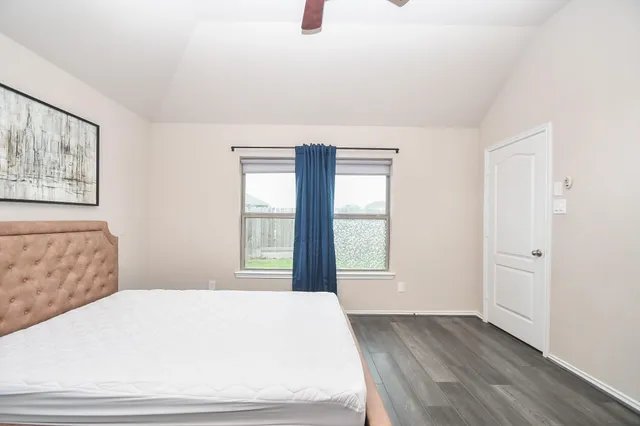 a bathroom with a sink vanity granite and a mirror