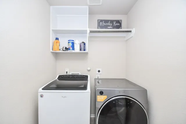 a view of a balcony with a swimming pool