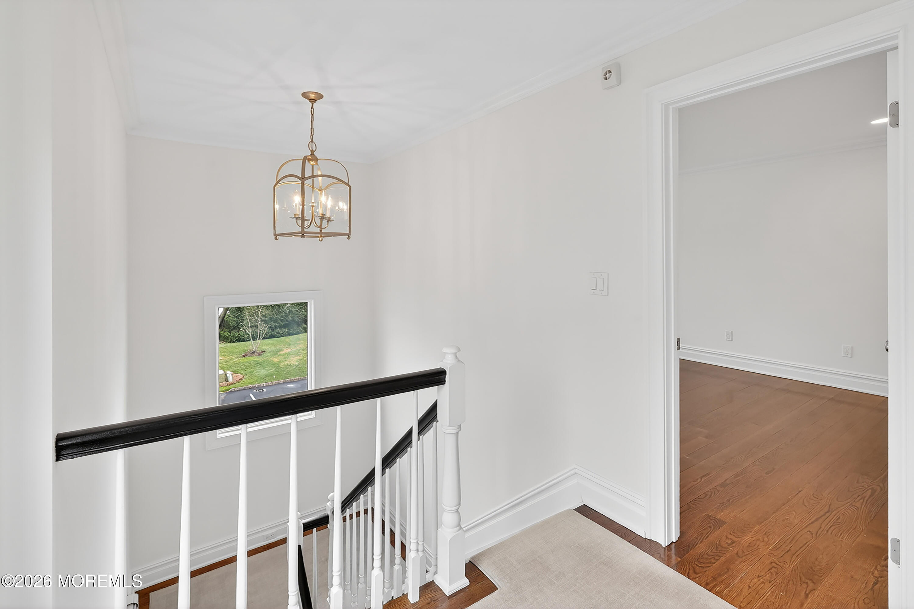 65 East River Road, Unit 20 Rumson, NJ 07760 - Photo 27 of 37 a view of a hallway with windows