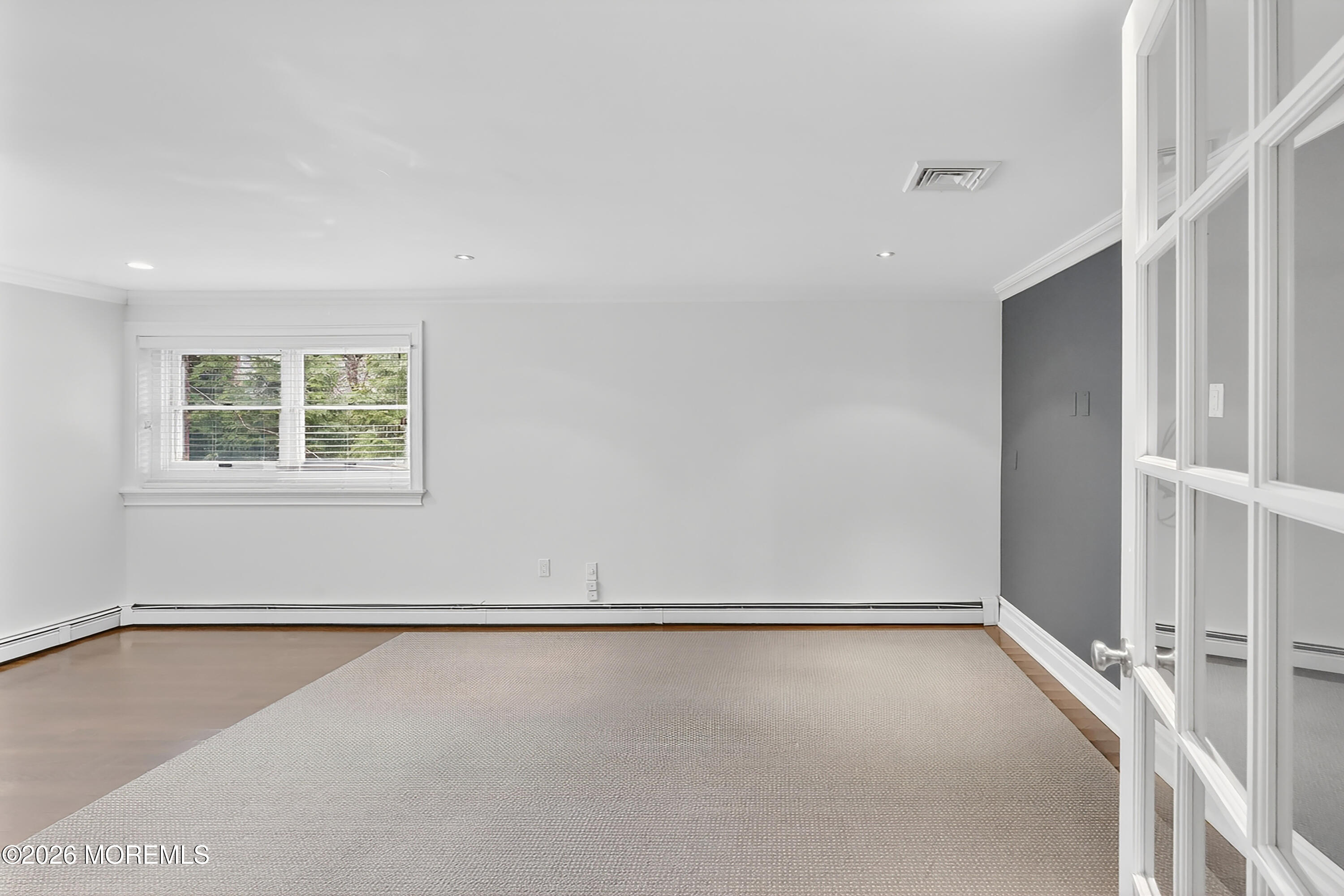 65 East River Road, Unit 20 Rumson, NJ 07760 - Photo 31 of 37 an empty room with a window