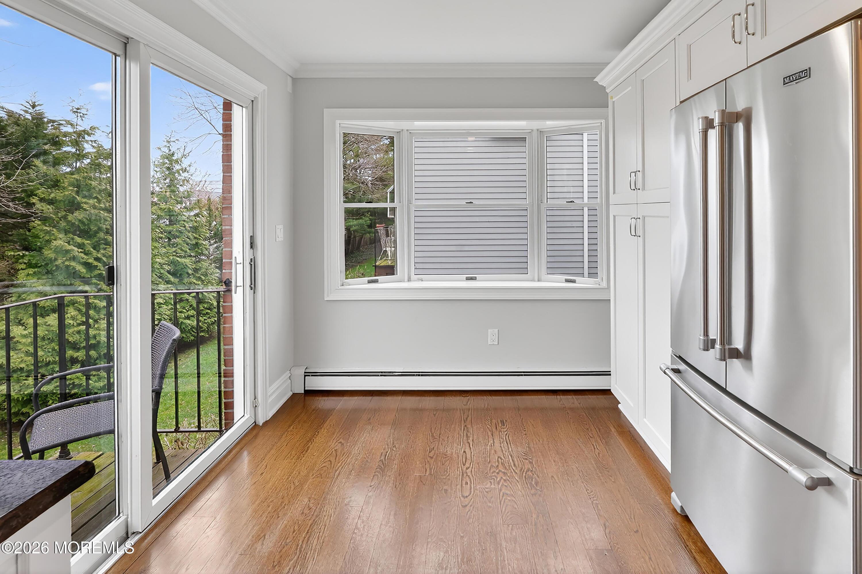 65 East River Road, Unit 20 Rumson, NJ 07760 - Photo 32 of 37 a view of a room with wooden floor and a window