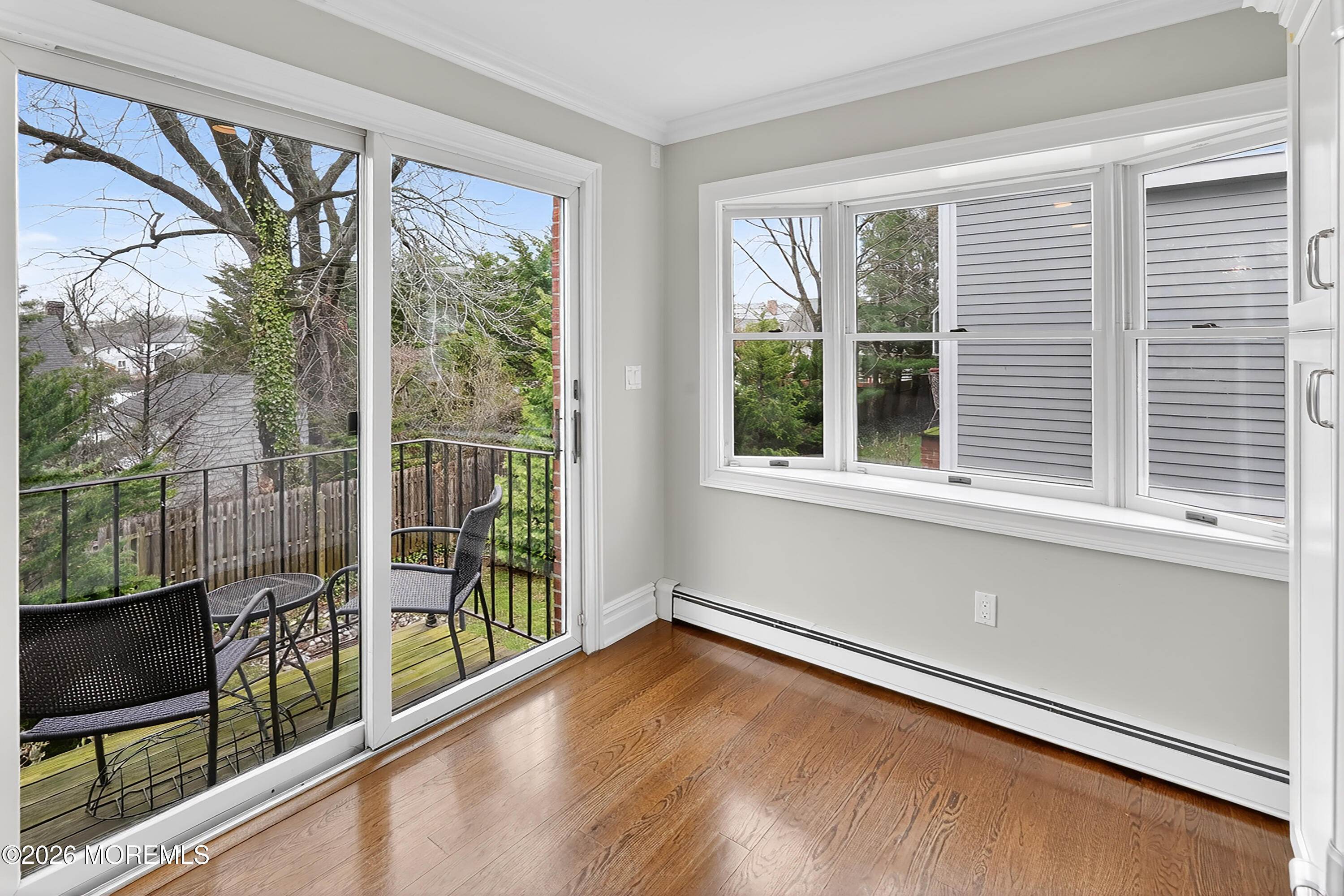 65 East River Road, Unit 20 Rumson, NJ 07760 - Photo 34 of 37 a view of a room with wooden floor and windows