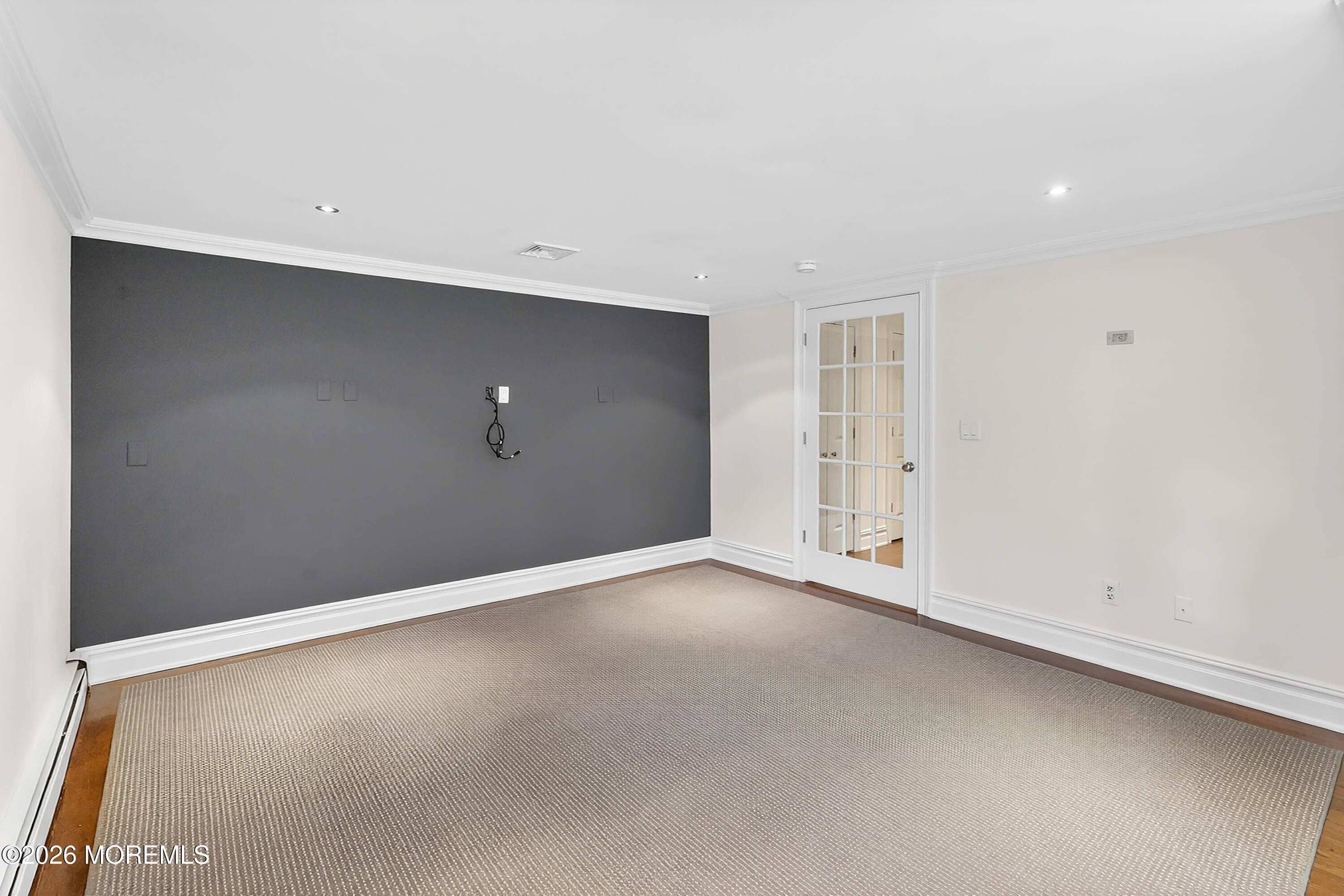 65 East River Road, Unit 20 Rumson, NJ 07760 - Photo 8 of 37 an empty room with an entryway