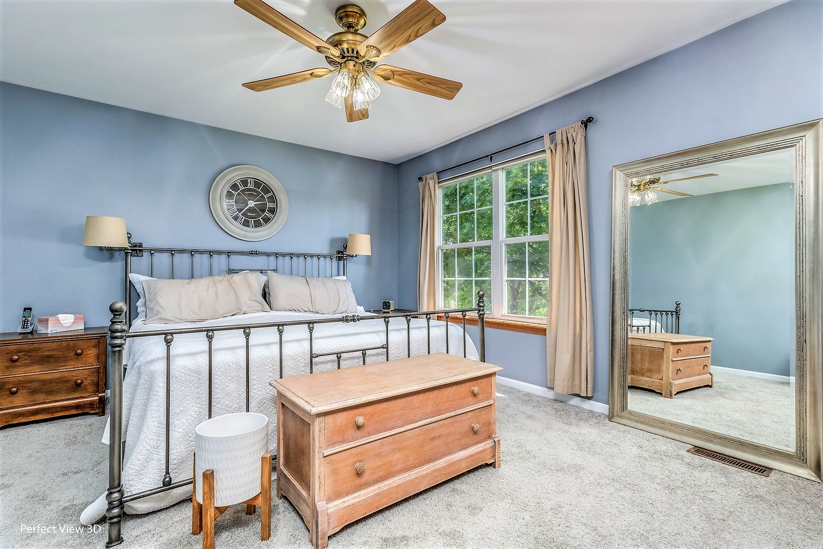 705 Churchill Lane Oswego, IL 60543 - Photo 17 of 34 a bedroom with a bed and a chandelier