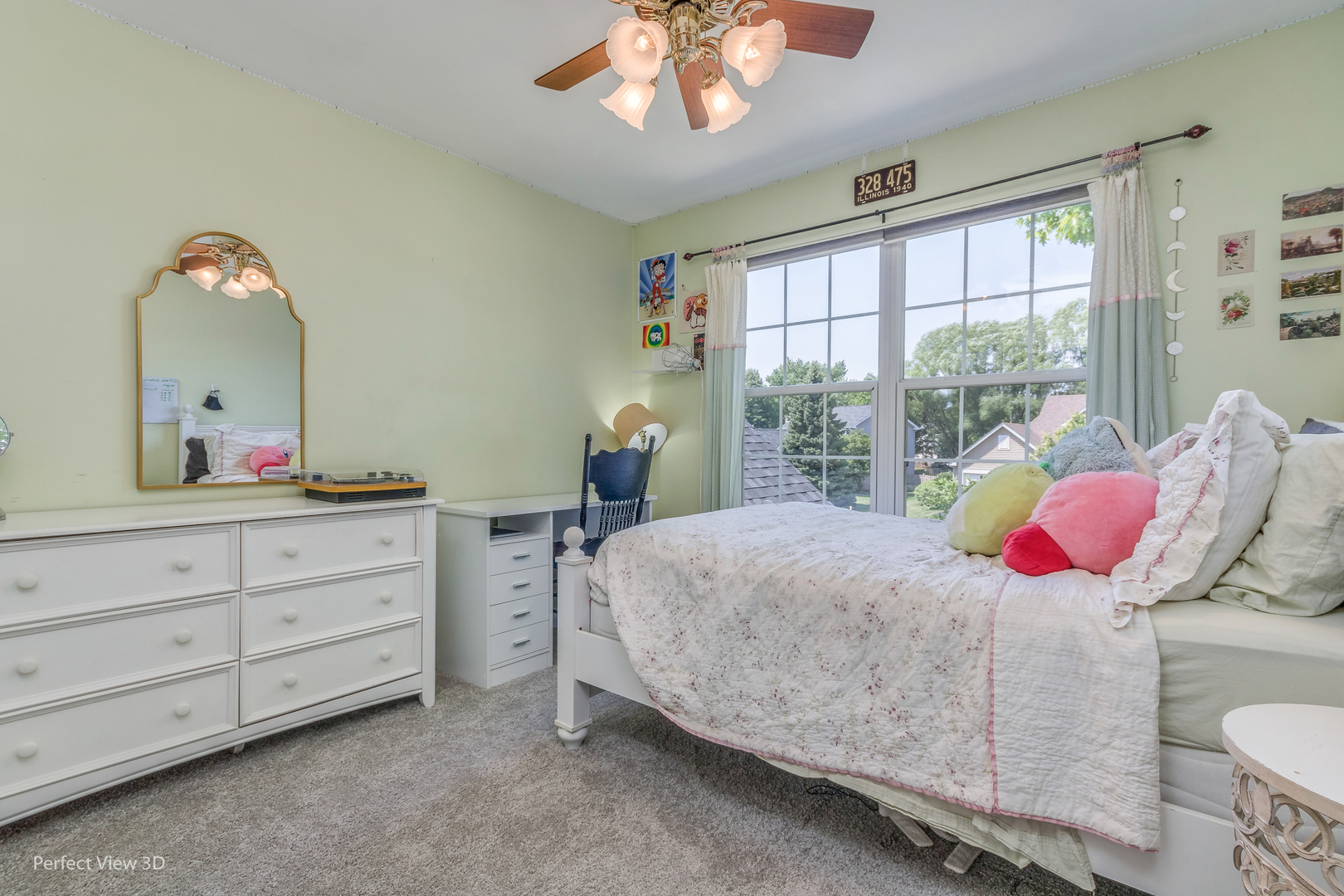 705 Churchill Lane Oswego, IL 60543 - Photo 20 of 34 a bedroom with a bed and a dresser
