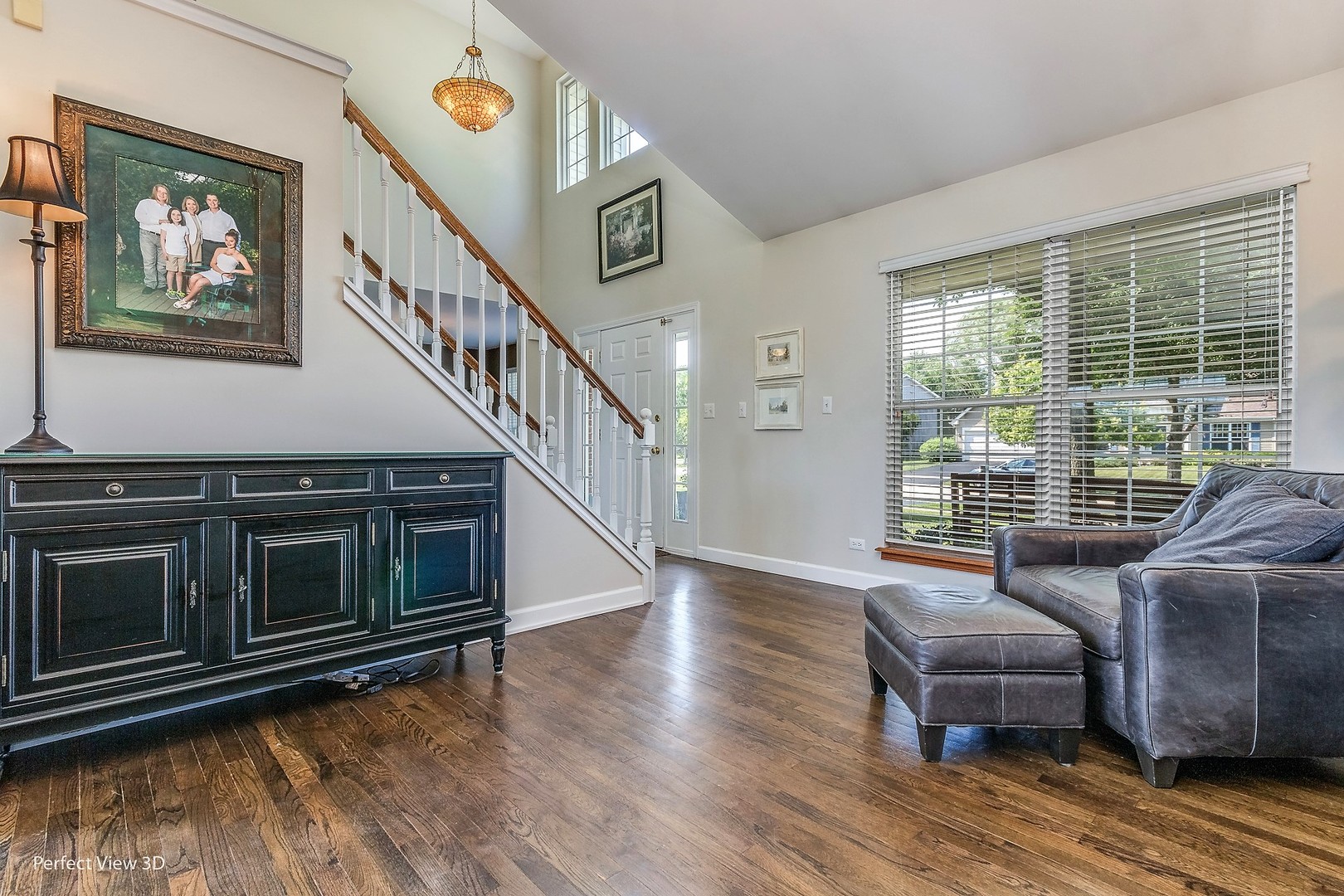 705 Churchill Lane Oswego, IL 60543 - Photo 2 of 34 a living room with furniture and a window