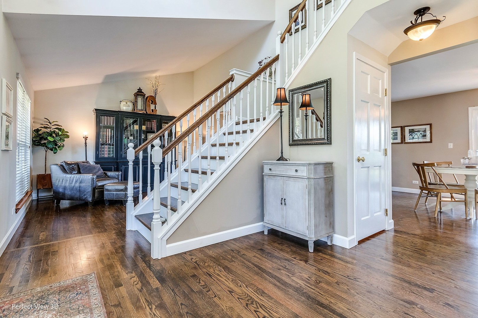 705 Churchill Lane Oswego, IL 60543 - Photo 4 of 34 a view of entryway and hall with wooden floor