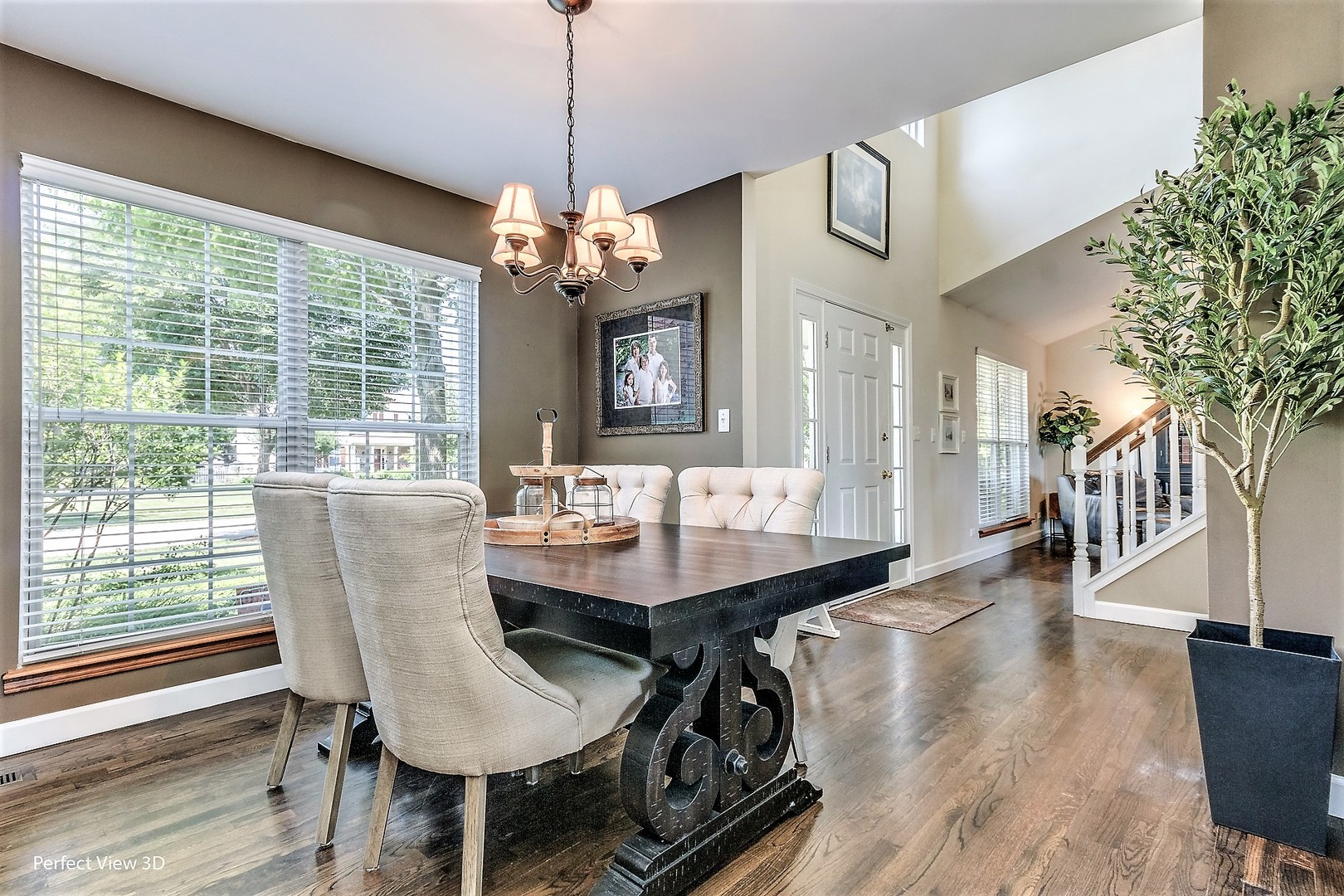 705 Churchill Lane Oswego, IL 60543 - Photo 5 of 34 a view of a dining room with furniture window and wooden floor